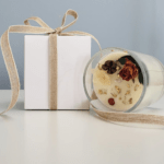 Handmade soy wax candle decorated with natural crystals and dried flowers, eco-friendly Irish gift choice