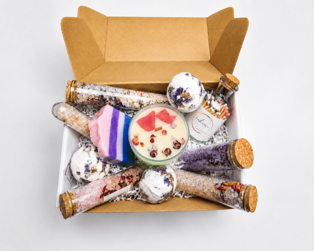 Luxury Honeysuckle spa hamper with a handmade soy candle, artisan soap, bath bombs, botanical bath salts and decorative matches in a premium gift box.
