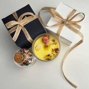 Premium handmade soy wax mango scented candle with an elegant Irish match jar, luxury gift for Irish homes.